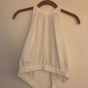 High neck white sleeveless blouse crop top